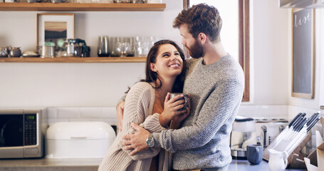 Couple, people and happy with hug in kitchen, together and support for unity. Relationship, happy...