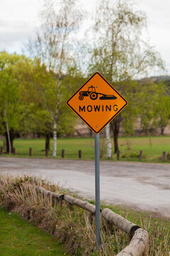 Mowing sign in permanent place in parkland