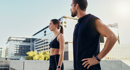 Man, woman and city for fitness, workout and exercise in urban with partnership for training. Friends, collaboration and personal trainer in outdoor for wellness, couple and teamwork in New York