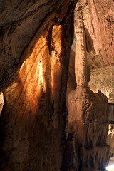 Inside limestone cave - different morphological elements created by driping or flowing water and...