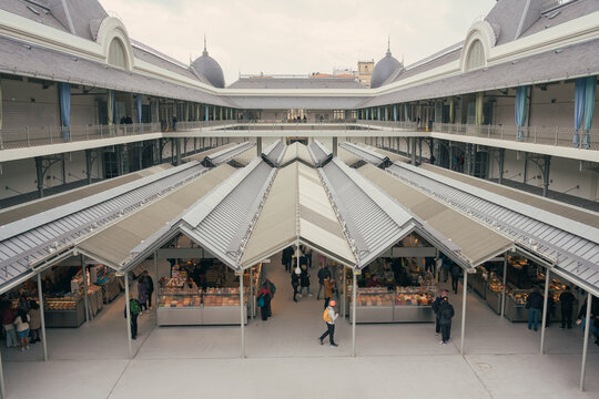 Bustling mercado de bolhao in Porto, Portugal featuring local vendors and shoppers