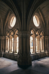 The inner courtyard of Porto Cathedral is bathed in a serene, diffuse light, casting soft shadows...