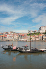 Obraz premium Scenic view of Porto historic waterfront and Douro river during daytime