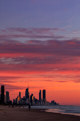 Colourful sunrise clouds over Surfers Paradise cityscape, viewed from Miami beach. Gold Coast Australia.