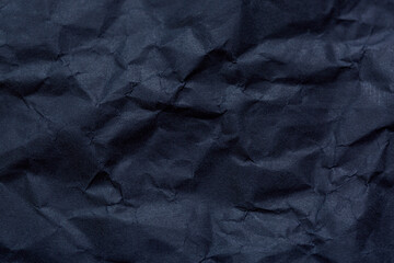 black paper texture,Black crumpled paper texture in low light background