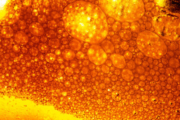 Yellow drink bubble texture close-up,Beer Background Ice Cold Pint With Water Drops Condensation,Golden yellow water drops. Nature collection.