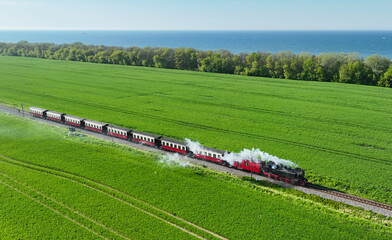 Aerial view of historical steam train Molli near Heiligendamm, Germany