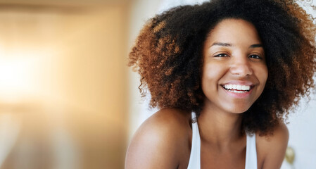 Black woman, portrait and smile with afro or natural beauty for morning routine in home, relax or...