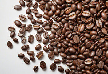 Pile of dark, roasted coffee beans on a white background