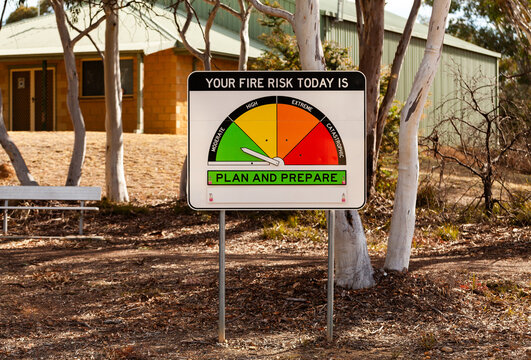 New fire danger rating sign indicating moderate fire risk near fire station 