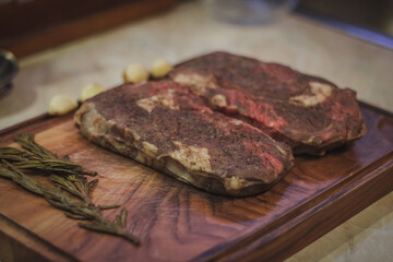 beef steak sous vide with rosemary and garlic, home cooked dish