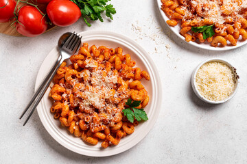 Cavatappi pasta with tomato sauce and parmesan cheese