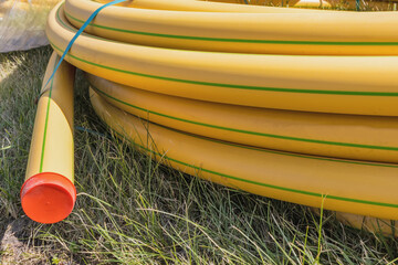 Roll of protective pipes to cover underground cables