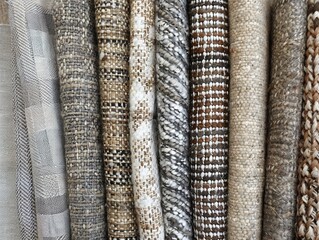 Rustic and cozy fabric textures featuring wool and linen for a homey feel Earth tones, natural patterns
