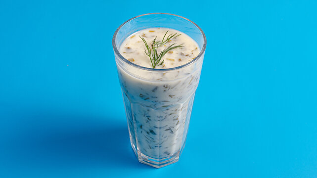 Refreshing dovga glass isolated on blue