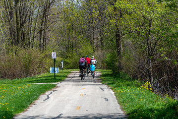 Bicycle Riders Enjoying A Spring Day On A Wisconsin Trail