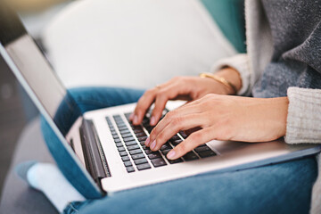 Fototapeta premium Laptop, hands and person typing in apartment for online research with work from home creative job. Computer, keyboard and freelance copywriter with website or internet project for career in house.