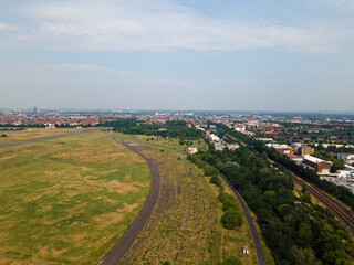Fototapeta premium Aerial landscape of Tempelhofer Feld runway at abandoned airport in summer in Central Berlin