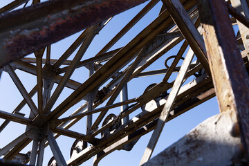 Aabndoned indutrial metal structure from rusty steel beams