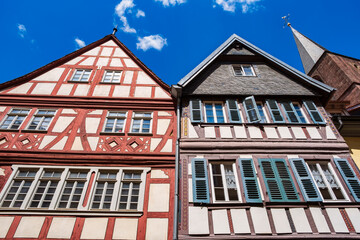 Looking up at two typical half-timbered houses in Neustadt an der Weinstrasse