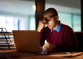 Stress, headache and businessman with glasses, laptop or vertigo in night office with eye strain,...