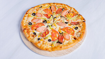 Pizza on wooden tray isolated