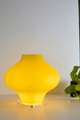 Post-modern light with vintage glass shade. Lively yellow table lamp with modern wiring. 