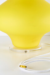 Post-modern light with vintage glass shade. Lively yellow table lamp with modern wiring. 