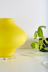 Post-modern light with vintage glass shade. Lively yellow table lamp with modern wiring. 