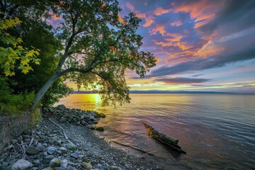 Sunset painting the sky with hues of orange, pink, and purple, signaling the end of summer day