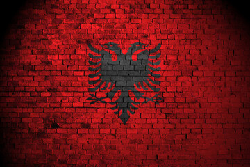 albanian flag on brick wall