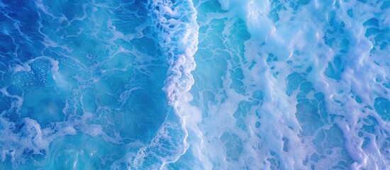 Ocean waves texture with blue ripples and white foam. Summer tropical travel panorama , turquoise blue and white surf surface for copy space by Vita for web or mobile