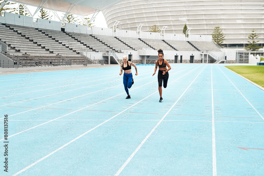 Canvas Prints Woman, athletes and running at stadium for fitness, exercise and training, speed and endurance for marathon race. People, active and field for sport with energy, power and activity for competition