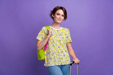 Photo of charming girl tourist wear trendy print clothes hold suitcase wait plane visa registration...