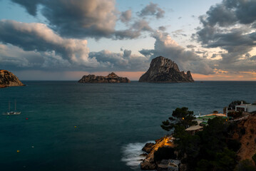 Panoramic view of red sunset clouds over Es Vedra and Es Vedranell islands, Sant Josep de Sa Talaia, Ibiza, Balearic Islands, Spain
