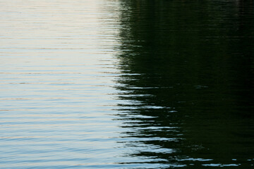 Dual Realms. Reflections in the Lake. Two different worlds, concept.