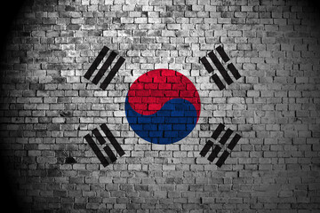 south korea flag on brick wall