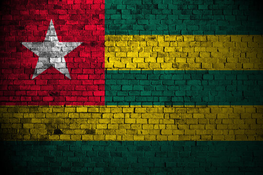 togo flag on brick wall