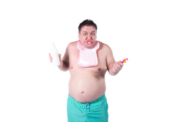 Funny day. Satisfied fat man in a child's costume. The guy poses in the studio on a white background. Fun and joy.