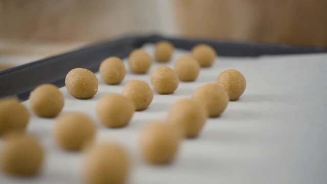 Preparation of panellets a traditional Spanish and Catalan sweets for All Saints Day and Halloween