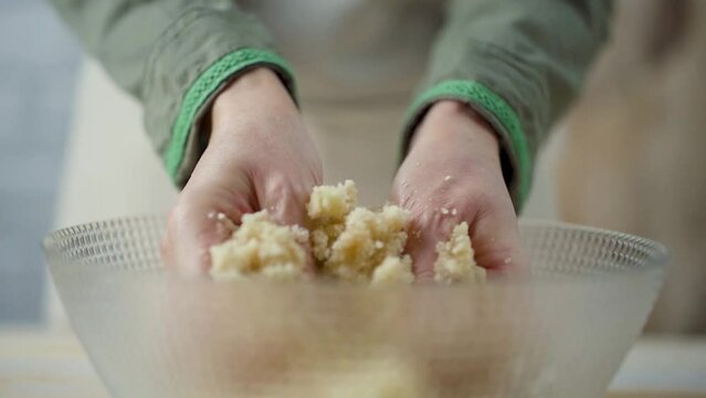 Preparation of panellets a traditional Spanish and Catalan sweets for All Saints Day and Halloween