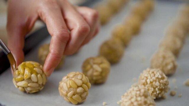 Preparation of panellets a traditional Spanish and Catalan sweets for All Saints Day and Halloween