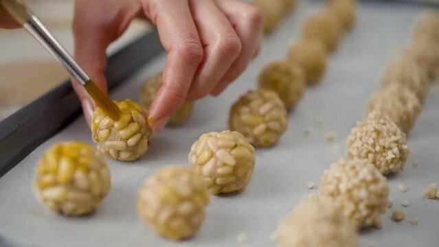 Preparation of panellets a traditional Spanish and Catalan sweets for All Saints Day and Halloween