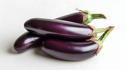 Close up of fresh Eggplants on a white Background