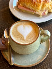 cup of coffee latte on a wooden surface in a coffee shop