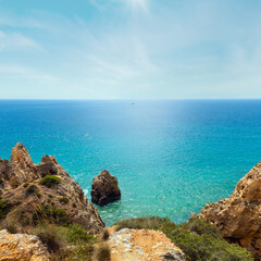 Atlantic rocky coast ( Lagos, Algarve, Portugal).