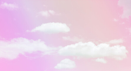 Purple pink orange yellow pastel sky with white cloud. Cumulus clouds. Wedding, Love, Valentine, Romance background. Summer tropical holiday sky. Beautiful nature.