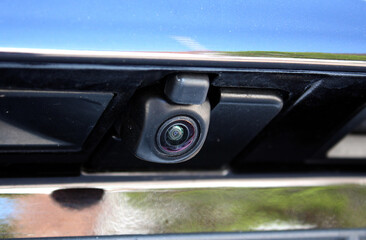 Premium car rear view camera for parking assistance. Concept of safety car driving while parking process. Car rear camera. Rear view camera.