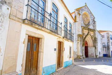 church of São João Alporão with the facade of Pedro Alvares Cabral s house in the foreground,...