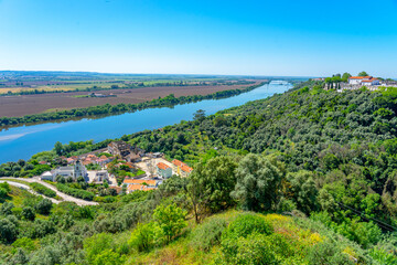 panoramic view of the Tagus River from the Jardim das Portas do Sol in the Portuguese city of...